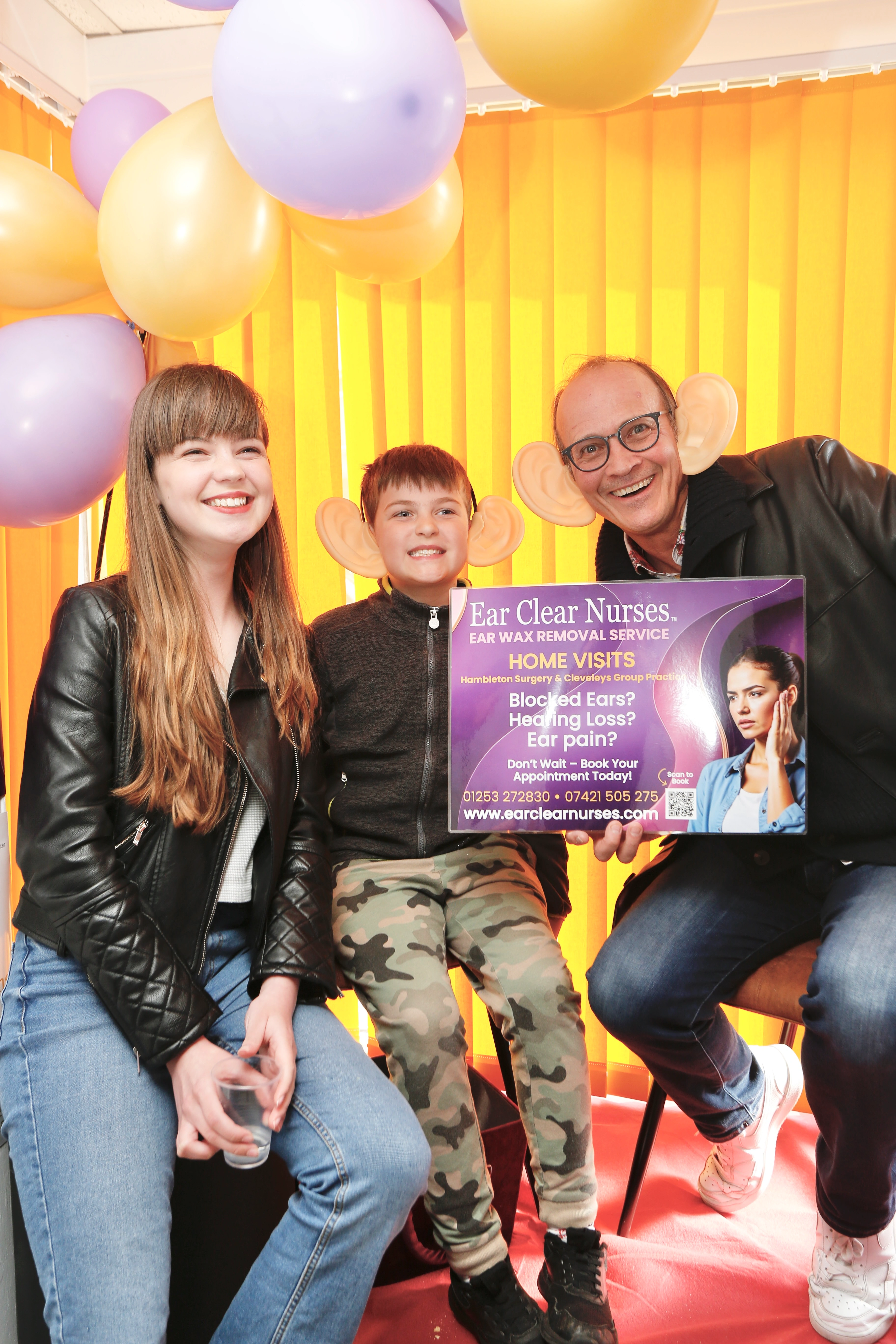 Steve Royle taking a cheerful selfie with local visitors during the open day