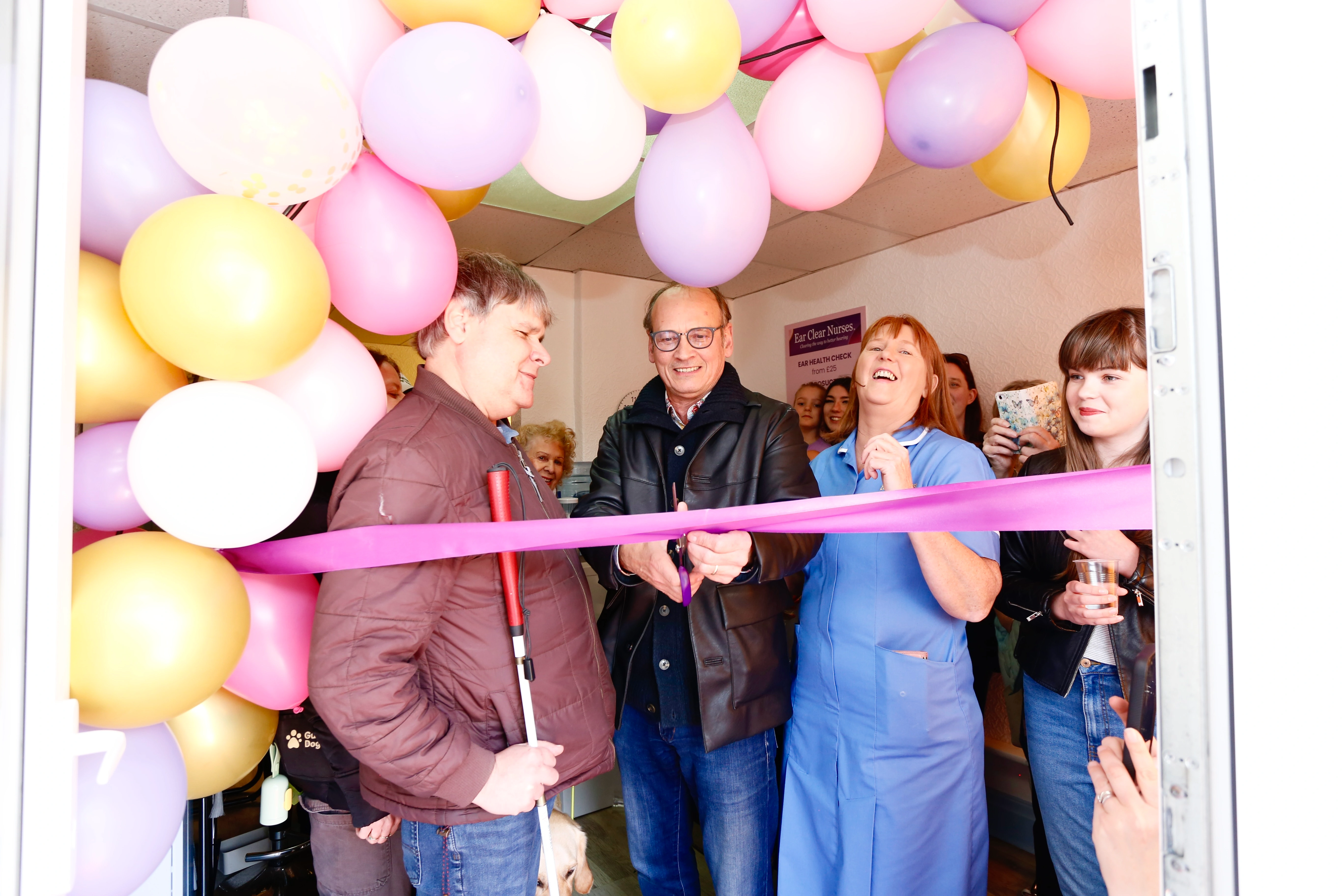 Open day ribbon cutting with Steve Royle and guests at Ear Clear Nurse in Cleveleys